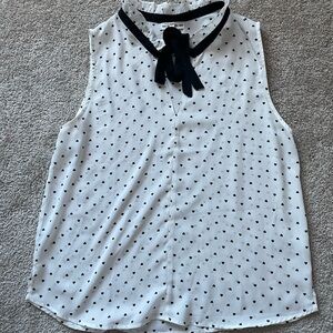 Chic Sleeveless Blouse with Black Heart Design